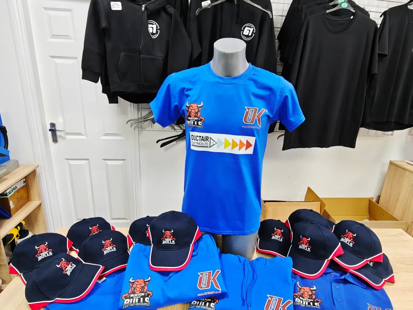 Buxton Bulls printed supporter hoodie, embroidered caps and team merchandise
