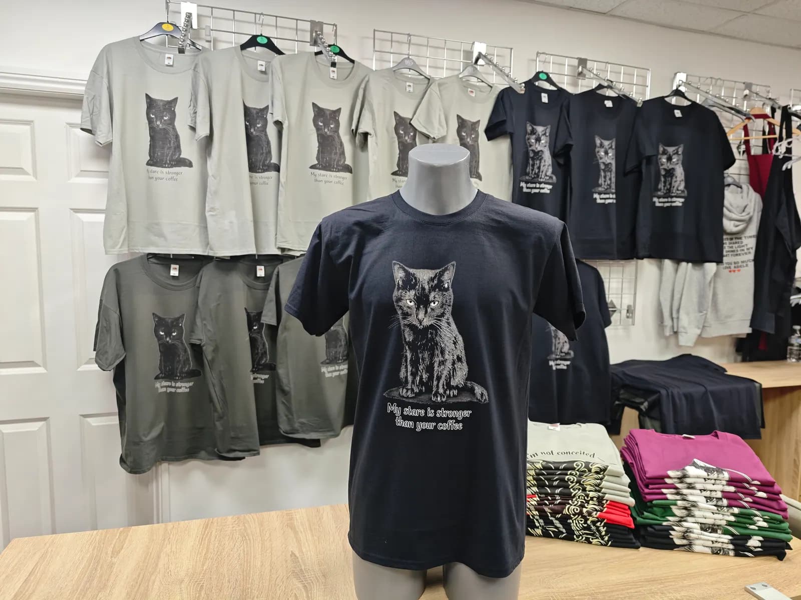 Black My Stare Is Stronger cat t-shirt printed for an Erdington e-commerce brand