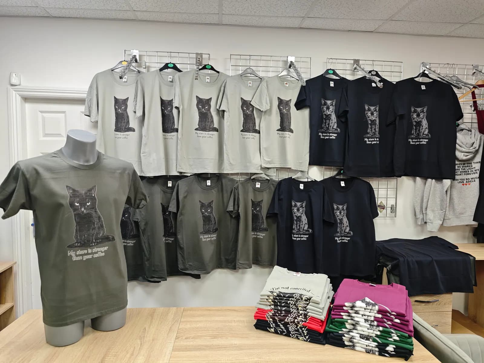 Bulk cat t-shirt printing display at OK T-Shirt Great Barr Birmingham